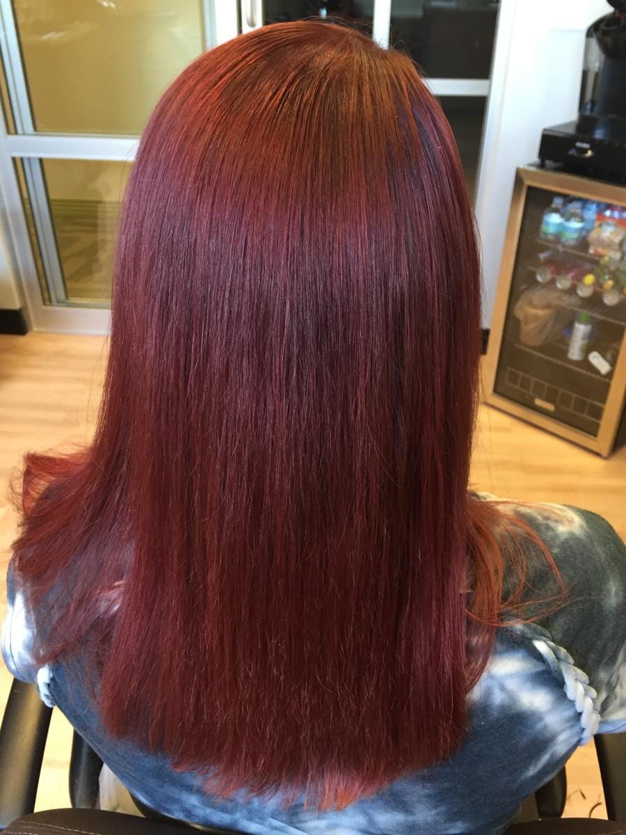 Salon portrait showing completed color and styling work.